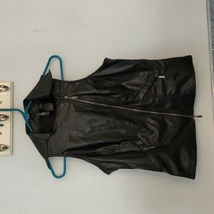 Size M. Faux black leather vest